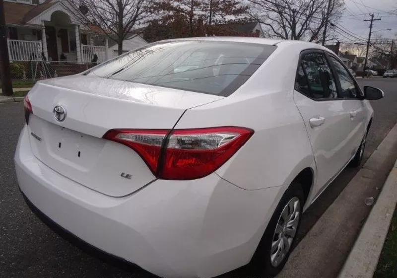 Toyota Corolla,  2014 модель белого цвета,  38079 км пробега... 4